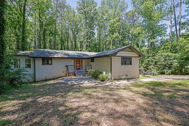 4066 Covered Bridge Rd SW, Smyrna, GA 30082 - view of front of property with brick siding and crawl space