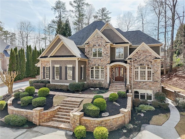 craftsman-style home featuring french doors