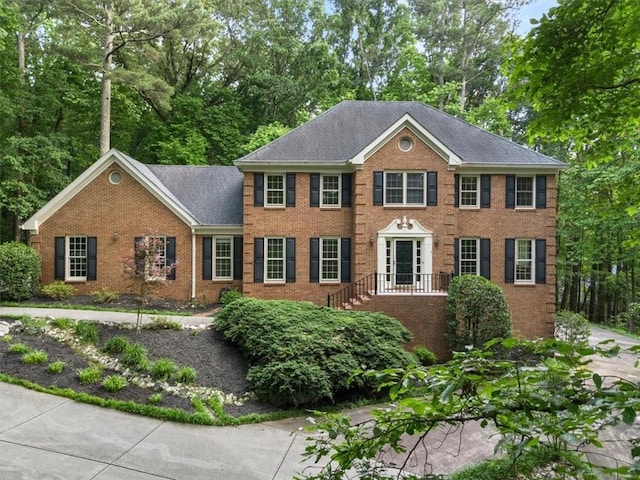 127 Roe Hampton Ln, Stone Mountain, GA 30087 - view of front facade featuring brick siding
