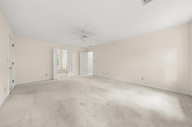 127 Roe Hampton Ln, Stone Mountain, GA 30087 - unfurnished room featuring light colored carpet and a ceiling fan