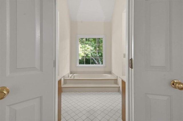 127 Roe Hampton Ln, Stone Mountain, GA 30087 - full bath with a garden tub and tile patterned floors