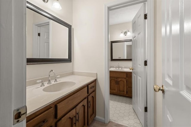 127 Roe Hampton Ln, Stone Mountain, GA 30087 - bathroom with vanity and tile patterned flooring