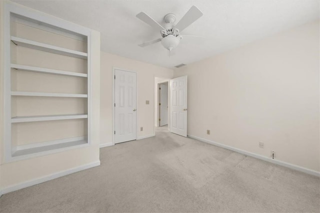 127 Roe Hampton Ln, Stone Mountain, GA 30087 - unfurnished bedroom featuring carpet floors and ceiling fan