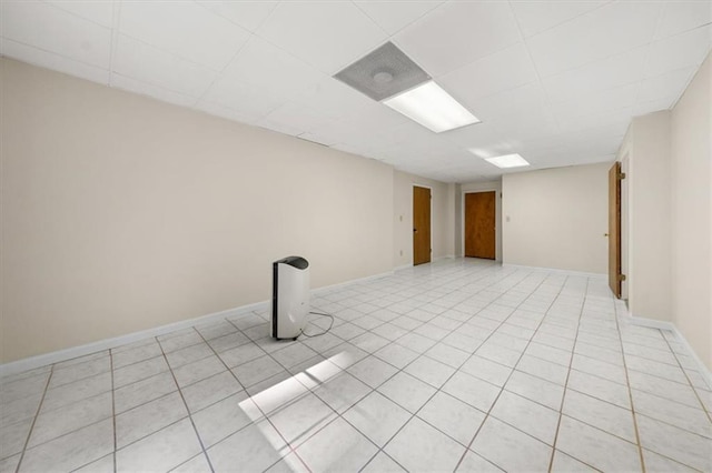 127 Roe Hampton Ln, Stone Mountain, GA 30087 - finished below grade area with light tile patterned flooring and a paneled ceiling