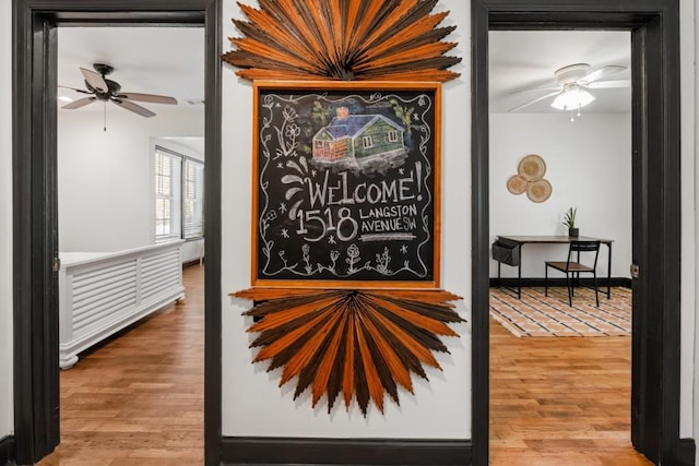 interior space featuring ceiling fan