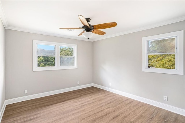 1521 Bonner Gilbert Rd, Macon, GA 31220 - unfurnished room featuring healthy amount of natural light, wood finished floors, crown molding, and a ceiling fan