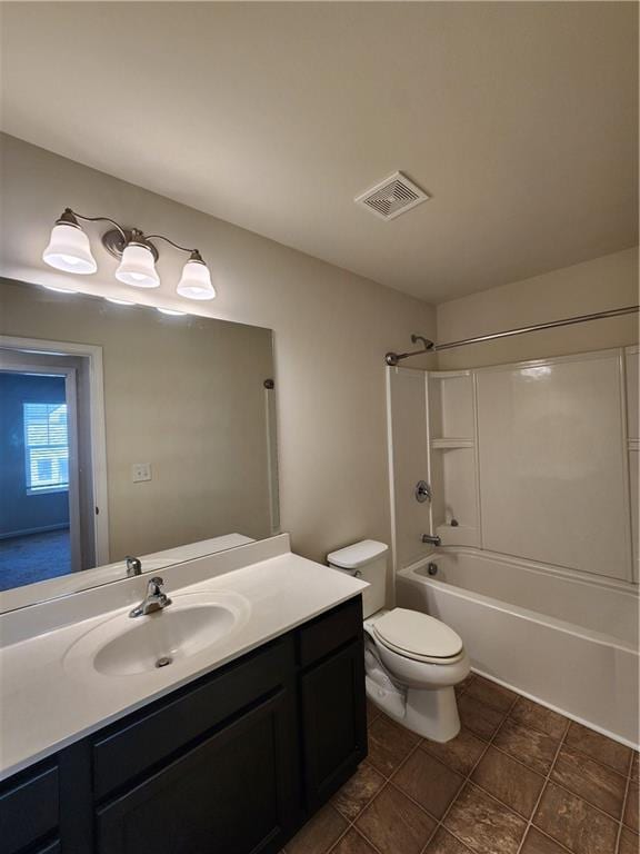 full bathroom with bathing tub / shower combination, vanity, and toilet