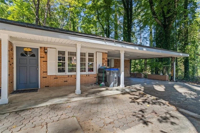 exterior space featuring a carport