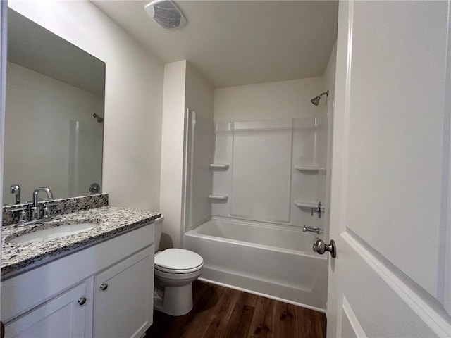 1958 Asher Ln Unit 50, Conyers, GA 30013 - full bathroom featuring wood finished floors, toilet, tub / shower combination, and vanity