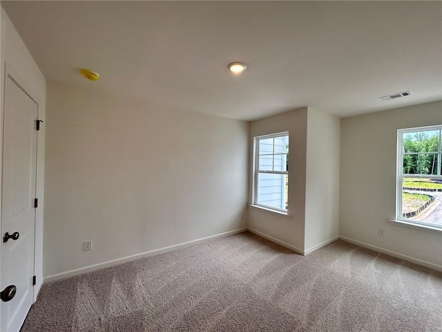 1958 Asher Ln Unit 50, Conyers, GA 30013 - unfurnished room featuring light carpet, baseboards, and a smoke detector