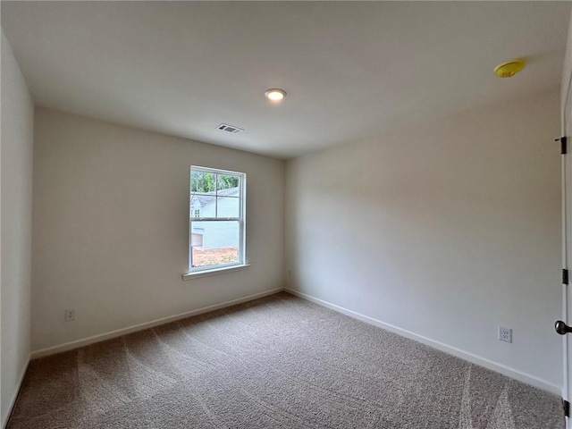 1958 Asher Ln Unit 50, Conyers, GA 30013 - spare room featuring carpet floors and baseboards