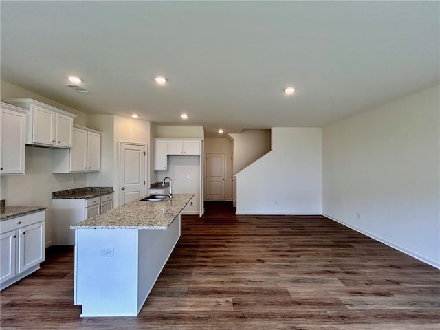 1958 Asher Ln Unit 50, Conyers, GA 30013 - kitchen featuring a sink, white cabinetry, a center island with sink, recessed lighting, and dark wood-style floors