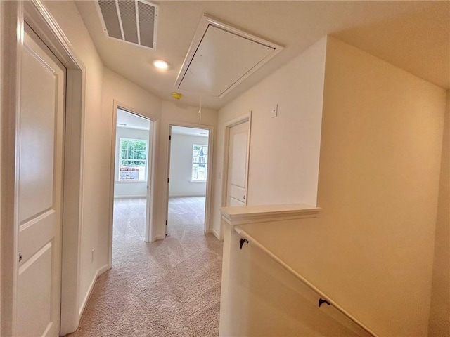 1958 Asher Ln Unit 50, Conyers, GA 30013 - corridor featuring attic access, light carpet, baseboards, and recessed lighting