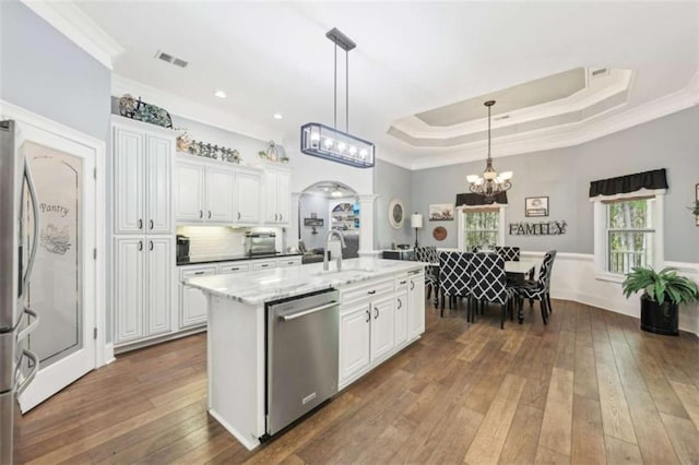 270 Morrow Rd, Newborn, GA 30056 - kitchen featuring appliances with stainless steel finishes, a sink, ornamental molding, a chandelier, and white cabinetry
