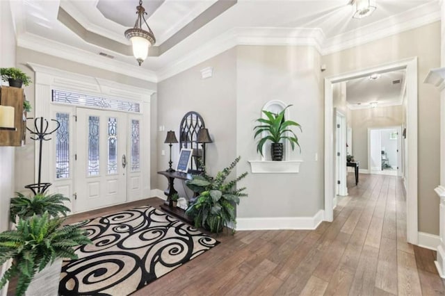 270 Morrow Rd, Newborn, GA 30056 - foyer entrance featuring ornamental molding, hardwood / wood-style flooring, baseboards, and a tray ceiling
