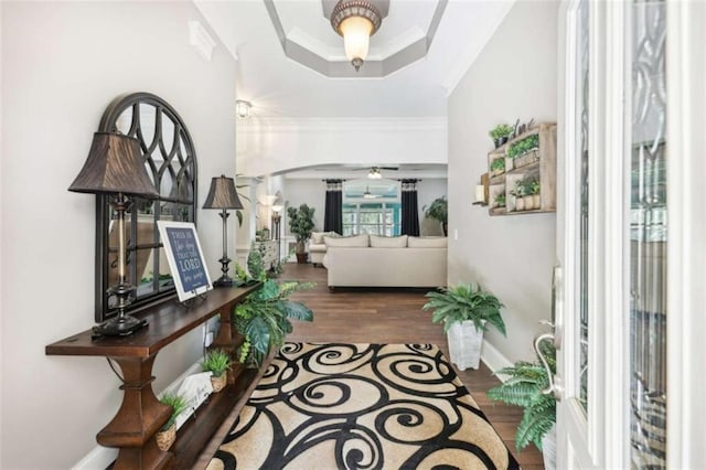 270 Morrow Rd, Newborn, GA 30056 - foyer entrance with arched walkways, wood finished floors, a tray ceiling, ornamental molding, and baseboards