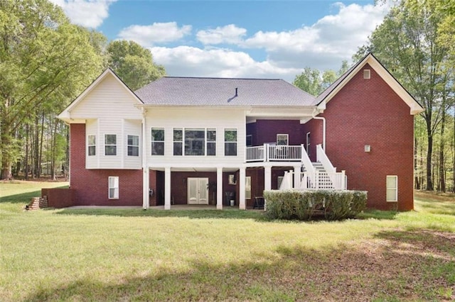 270 Morrow Rd, Newborn, GA 30056 - back of property with brick siding, stairs, and a lawn