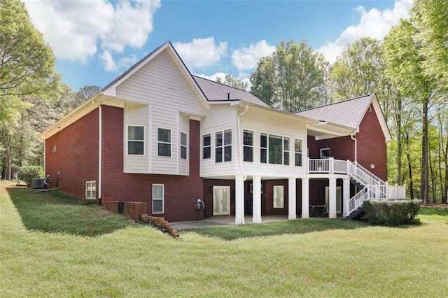 270 Morrow Rd, Newborn, GA 30056 - back of house featuring brick siding, stairway, central AC unit, a yard, and a deck