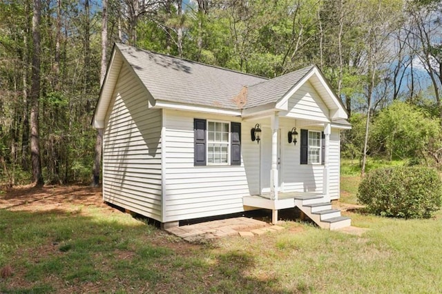 270 Morrow Rd, Newborn, GA 30056 - view of front of property with a front lawn and roof with shingles