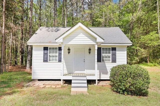 270 Morrow Rd, Newborn, GA 30056 - bungalow-style home featuring a front lawn