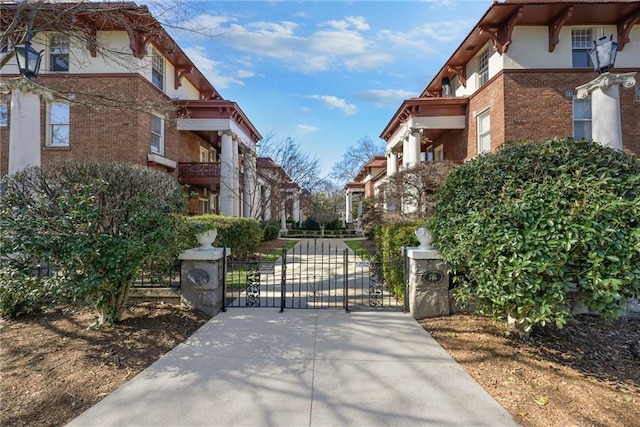 746 N Highland Ave NE Unit 7, Atlanta, GA 30306 - view of concrete surface with a gate and a gated entry