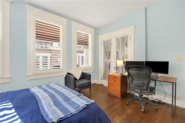 746 N Highland Ave NE Unit 7, Atlanta, GA 30306 - bedroom with wood finished floors, an office area, and baseboards