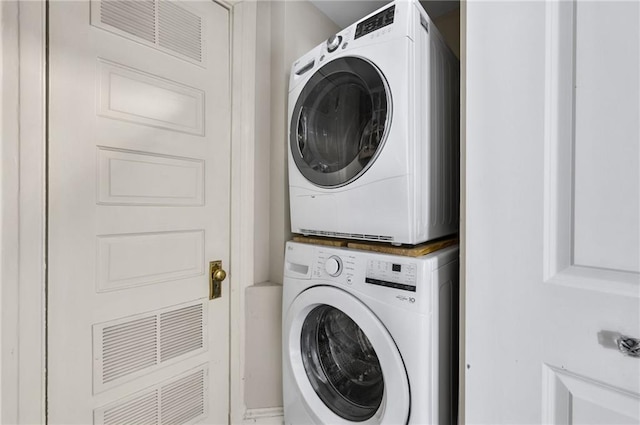 746 N Highland Ave NE Unit 7, Atlanta, GA 30306 - laundry area featuring stacked washing machine and dryer