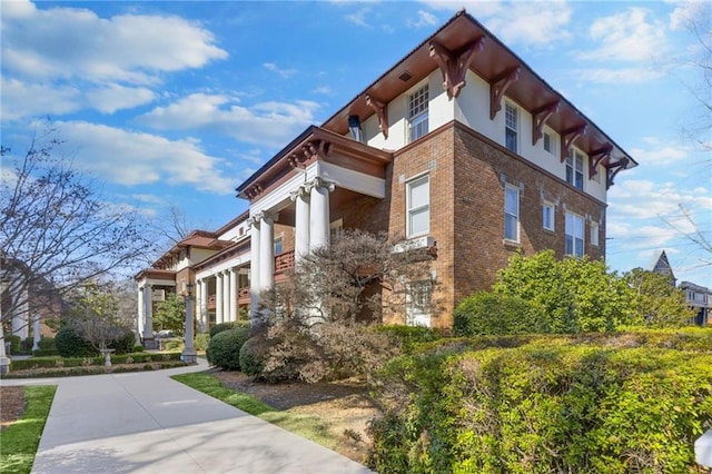 746 N Highland Ave NE Unit 7, Atlanta, GA 30306 - view of home's exterior featuring brick siding and stucco siding