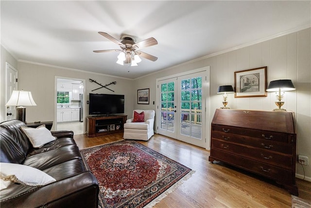 living area featuring plenty of natural light and wood finished floors