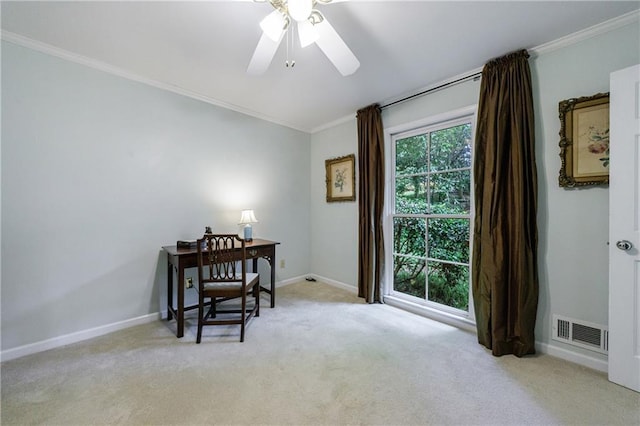 office area with visible vents, ornamental molding, baseboards, a ceiling fan, and carpet