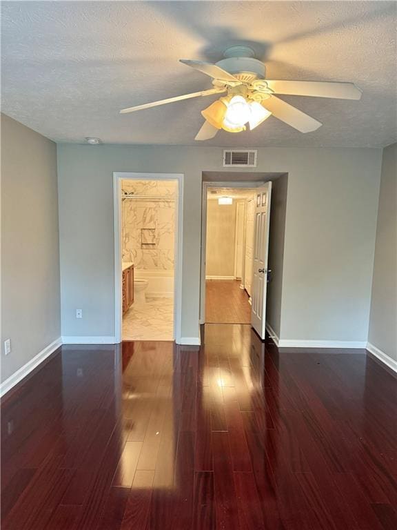 121 Brittany Ct, Duluth, GA 30096 - unfurnished room featuring wood finished floors, a textured ceiling, ceiling fan, and baseboards