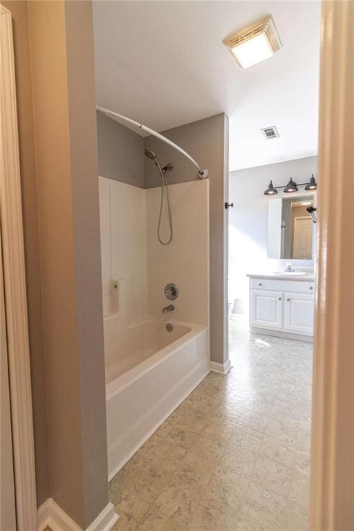 bathroom with vanity and tub / shower combination