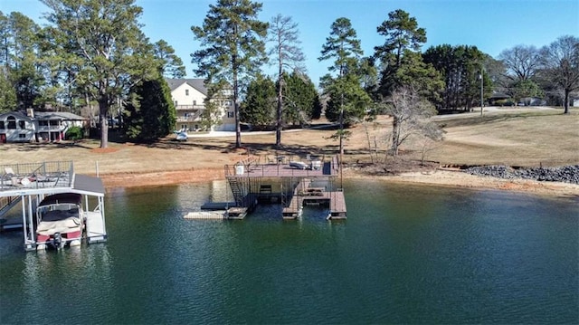 dock area with a water view