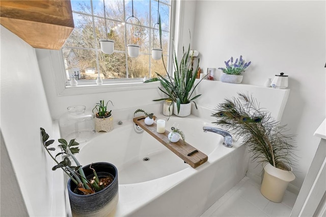 bathroom with a tub to relax in