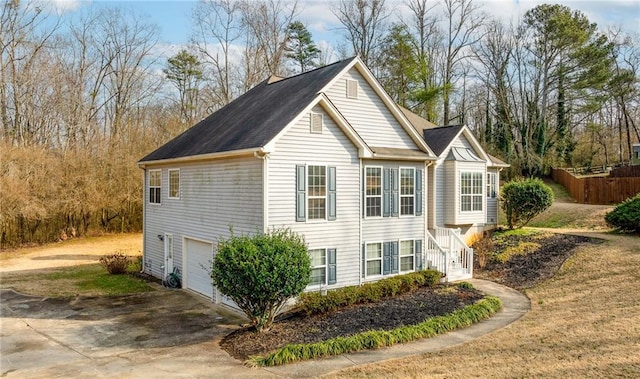 view of home's exterior featuring a garage