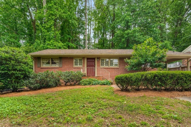 2556 Defoors Ferry Rd NW, Atlanta, GA 30318 - single story home featuring brick siding and a front yard
