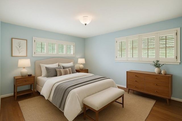 2556 Defoors Ferry Rd NW, Atlanta, GA 30318 - bedroom with multiple windows, baseboards, and wood finished floors