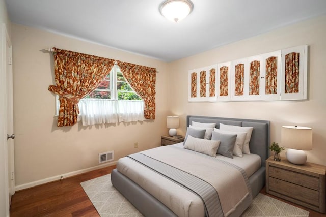 2556 Defoors Ferry Rd NW, Atlanta, GA 30318 - bedroom featuring baseboards and wood finished floors