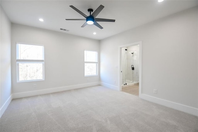 unfurnished bedroom featuring recessed lighting, baseboards, visible vents, and carpet flooring