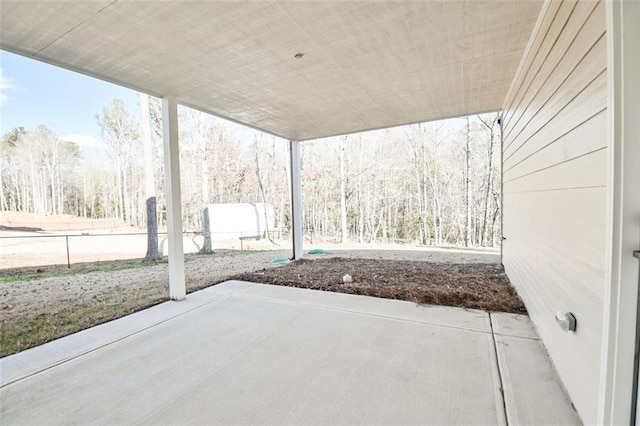 view of patio / terrace featuring fence