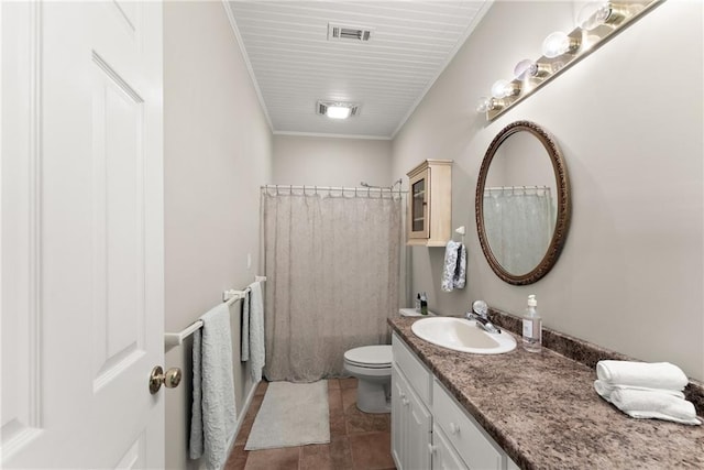 bathroom with tile patterned floors, crown molding, toilet, vanity, and visible vents
