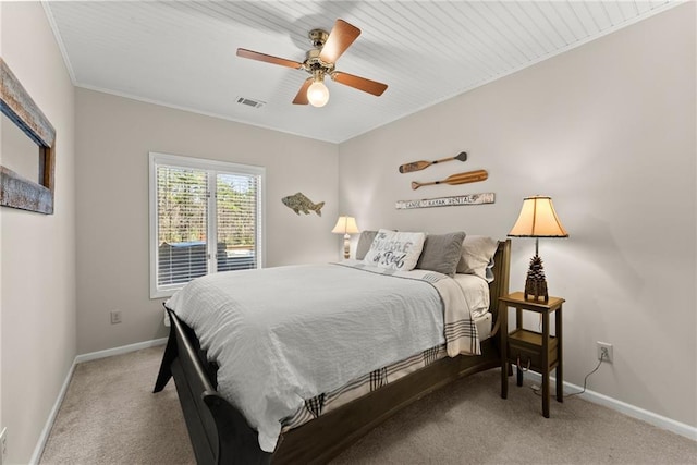 bedroom with baseboards, visible vents, and carpet floors
