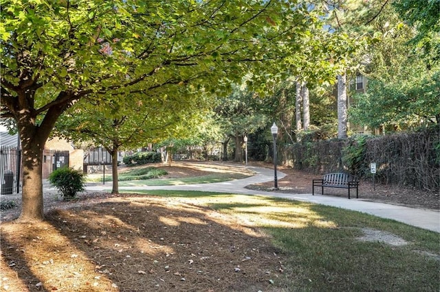 view of property's community with fence