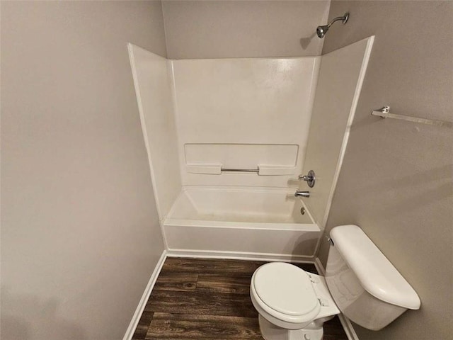 3763 Waldrop Hills Dr, Decatur, GA 30034 - bathroom featuring toilet, wood finished floors, baseboards, and bathing tub / shower combination