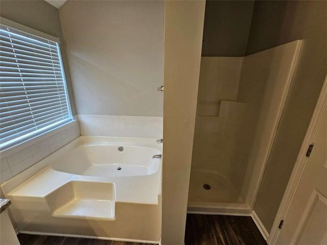 3763 Waldrop Hills Dr, Decatur, GA 30034 - full bath featuring a garden tub, wood finished floors, a stall shower, and plenty of natural light