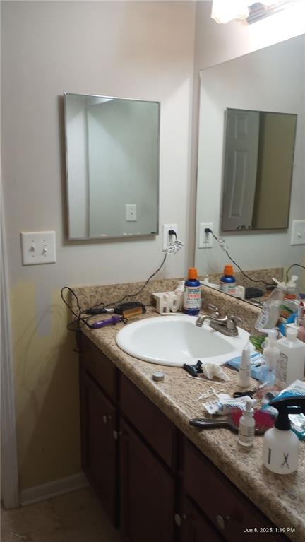 80 Place Fontaine, Lithonia, GA 30038 - bathroom featuring vanity and baseboards