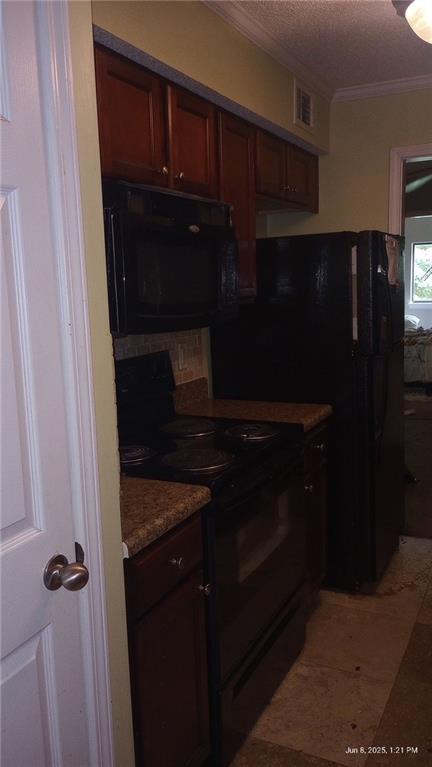 80 Place Fontaine, Lithonia, GA 30038 - kitchen featuring black appliances and crown molding