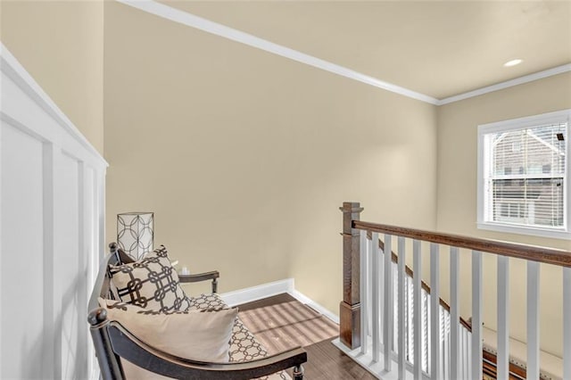 hallway with recessed lighting, ornamental molding, an upstairs landing, wood finished floors, and baseboards