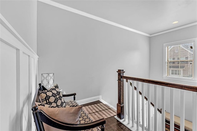 interior space featuring dark wood-style flooring, crown molding, recessed lighting, an upstairs landing, and baseboards