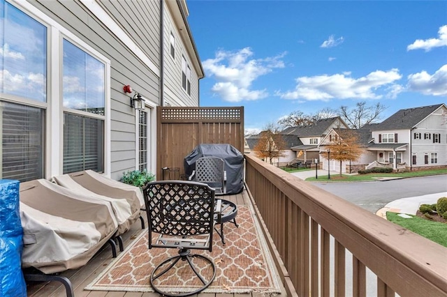 balcony featuring a residential view